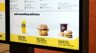 A McDonald's menu screen with calorie counts
