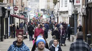 People shopping on a high street
