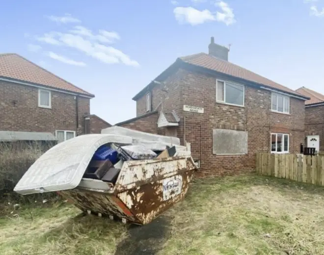 The house has two bedrooms and one bathroom and a skip in the garden