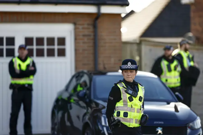 Police outside the home of former Scottish First Minister Nicola Sturgeon and her husband Peter Murrell on Thursday