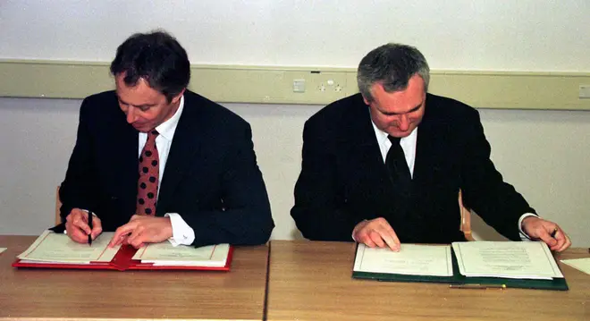 File photo dated 10/04/98 of then prime minister Tony Blair (left) and then Taoiseach Bertie Ahern signing the Good Friday peace agreement,