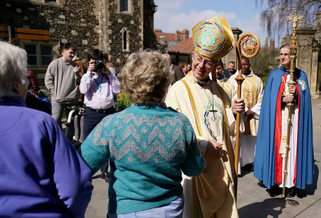 The Archbishop of Canterbury Justin Welby greets members of the congregation following the Easter Sung Eucharist at Canterbury Cathedral in Kent. Picture date: Sunday April 9, 2023.
