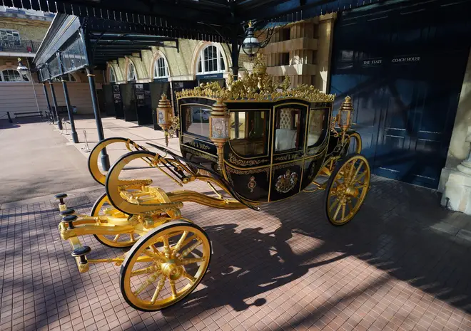 The Diamond Jubilee State Coach on display at the Royal Mews in Buckingham Palace, London