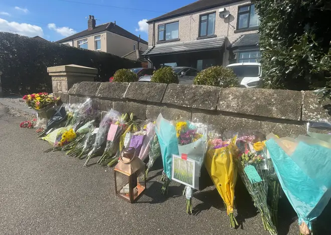 Floral tributes at the scene in Sheffield