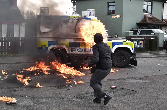 A police vehicle was attacked with petrol bombs yesterday during an illegal Dissident march in the Creggan area of Londonderry