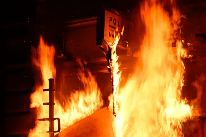 A police station in Rennes on fire during amid the various demonstrations taking place around the country