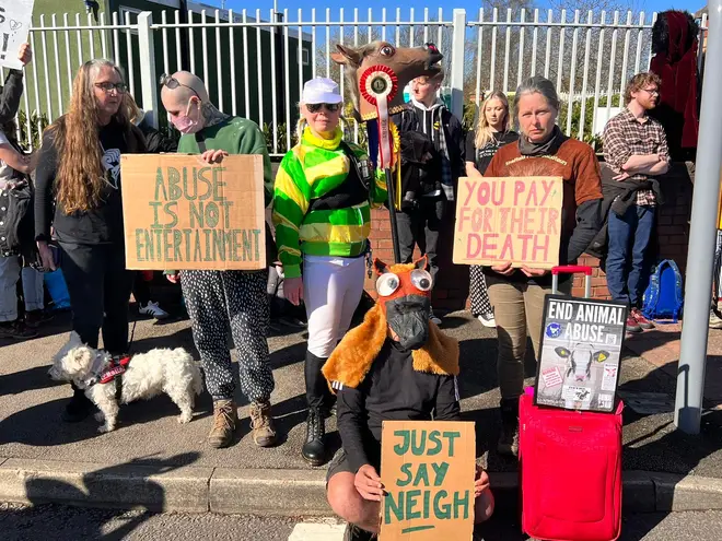 Protesters outside the racecourse
