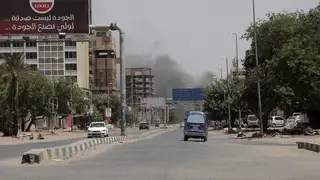 Smoke is seen rising from a neighbourhood in Khartoum, Sudan