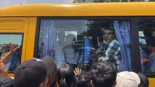 Family members and colleagues welcome prisoners released from Insein Prison in Yangon