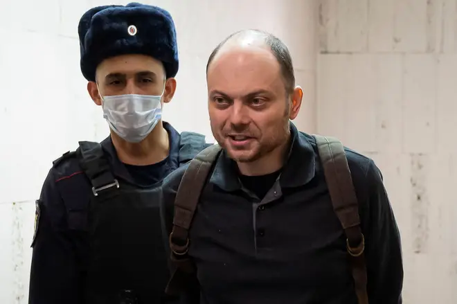 Russian opposition activist Vladimir Kara-Murza is escorted to a hearing in a court in Moscow, Russia.