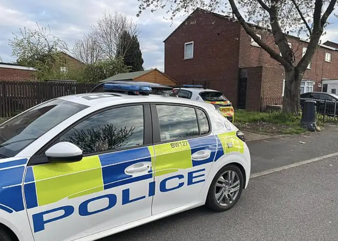 The area in the West Midlands was sealed off after the alleged attacks and two dogs were seized