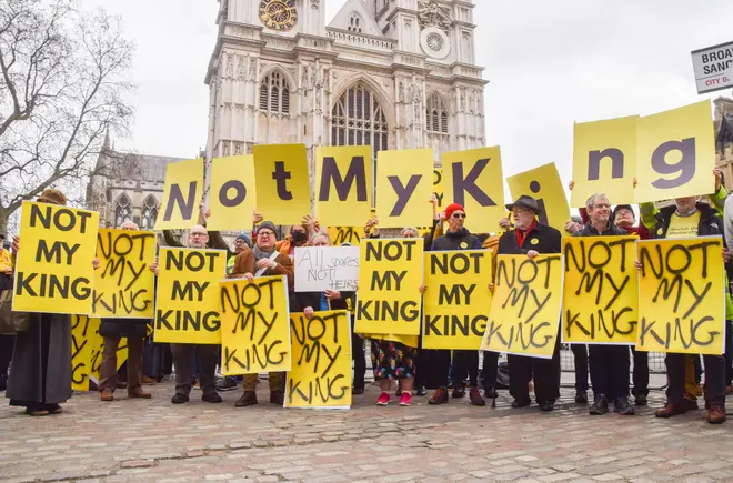 Anti-monarchy protesters gathered with Not My King signs outside Westminster Abbey