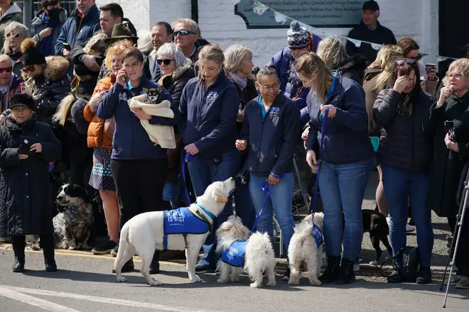 A 'guard of honour' by dogs is to be set up at the event.
