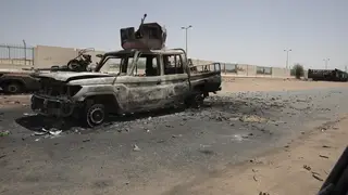 Destroyed military vehicles are seen in southern Khartoum, Sudan