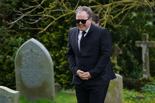 Alan Carr arrived to the procession to pay his respects.