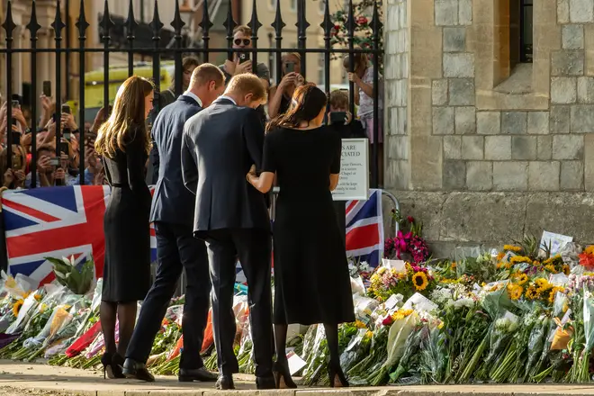 The four greeted well wishers on their walk following the death of Queen Elizabeth II.