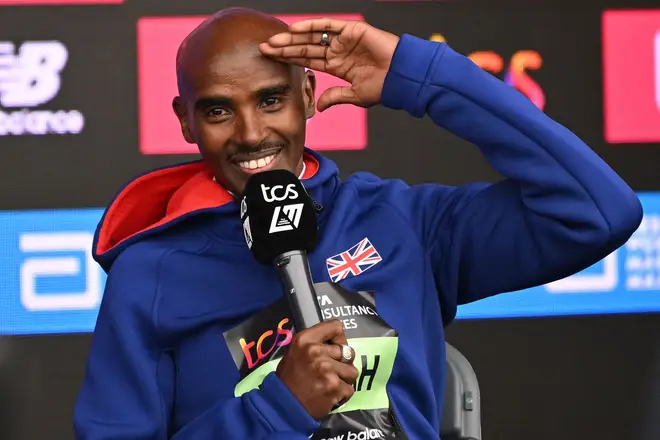 Britain's Mo Farah at a press conference after finishing the race