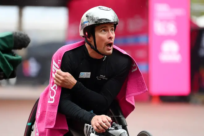 Switzerland's Marcel Hug after winning the Men's Wheelchair Marathon for the fifth time