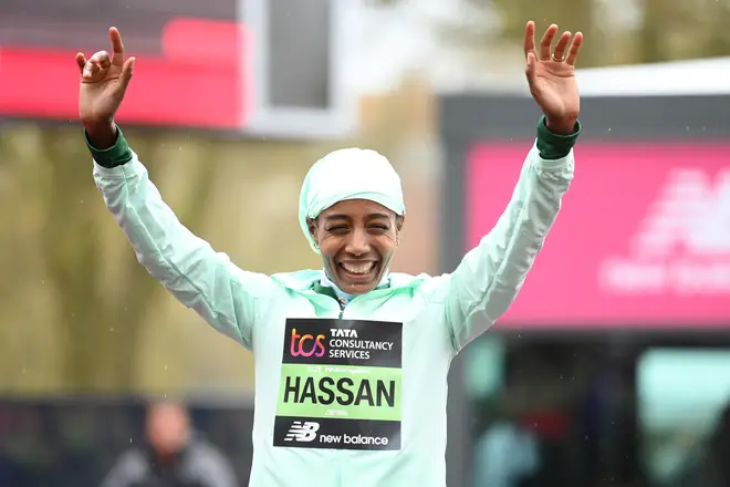 Sifan Hassan celebrates after winning the elite women's race on her marathon debut