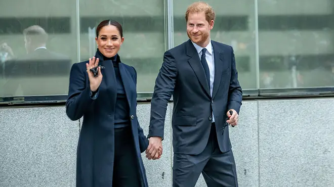 Meghan Markle and Prince Harry waving in New York where all black outfits
