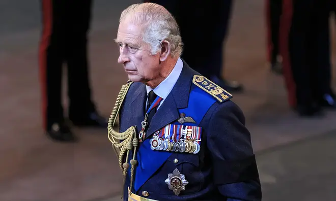 King Charles in his military uniform wearing his medals
