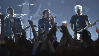 The Edge, Bono and Adam Clayton of U2