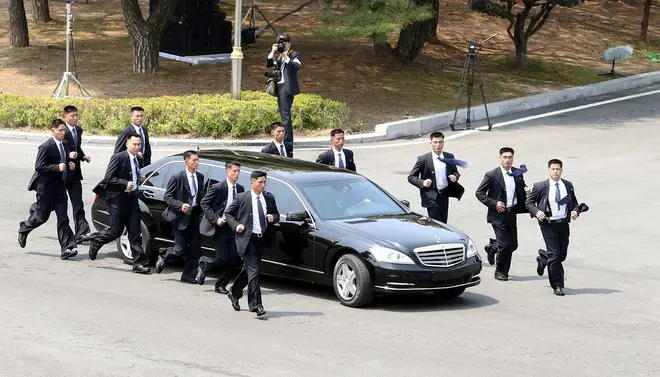 North Korean leader Kim Jong-un is frequently accompanied by running security guards
