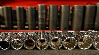 A row of socket wrench heads