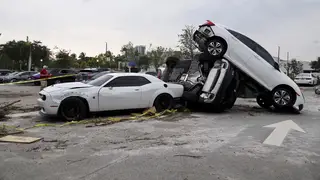 Damaged cars after a reported tornado hit the area in Palm Beach Gardens, Florida