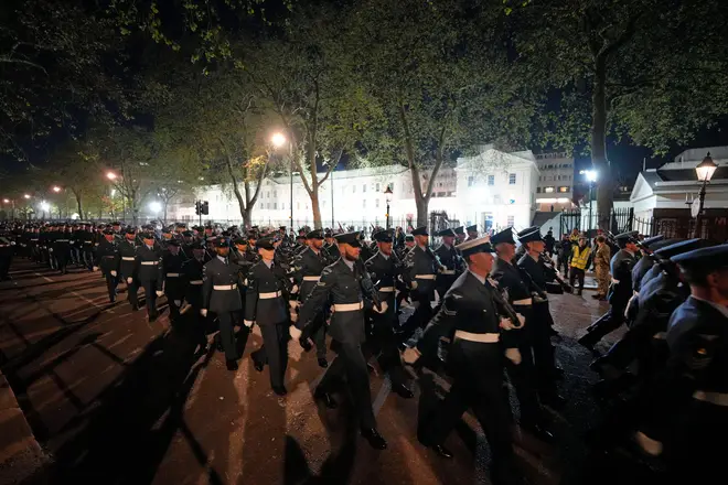 Troops marched in central London near Buckingham Palace and through Parliament Square