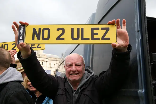 A protester holds a 'No 2 ULEZ' sign during the demonstration against ULEZ (Ultra Low Emission Zone) expansion in Trafalgar Square, central London. Sadiq Khan, Mayor of London plans to expand ULEZ to the whole of London