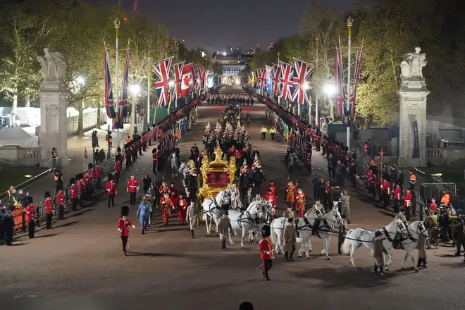 A night time rehearsal in central London for the coronation of King Charles III, which will take place this weekend.