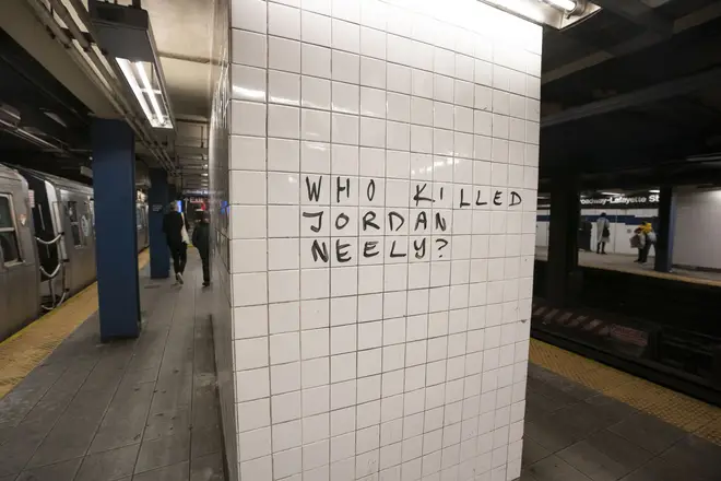 A sign left for Jordan at the subway station where he was killed