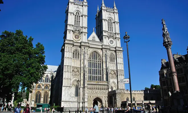 Westminster Abbey in London on a clear blue sky day