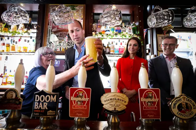 Kate and William pour a pint in the Dog and Duck, Soho