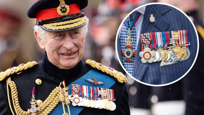 The King wears various medals and uniforms
