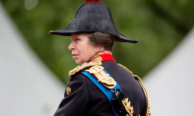 Princess Anne in full military uniform on horseback