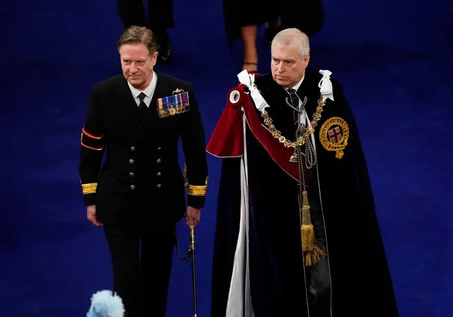 Andrew, 63, could be seen dressed in formal Order of the Garter robes for Coronation - despite being formally stripped of military duties and royal patronages.