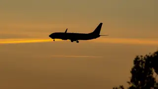 An aeroplane at sunset