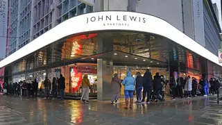 People queuing outside John Lewis on Oxford Street in London