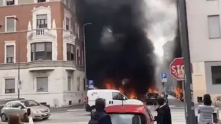 Multiple vehicles ablaze in a street in Milan 'after a van exploded'