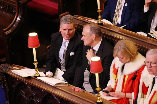 Liberal Democrat leader Sir Ed Davey talks with Labour leader Sir Keir Starmer in Westminster Abbey ahead of the Coronation of King Charles III