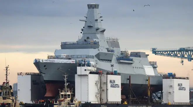 An internal inquiry has been launched after several cables onboard a next-generation Royal Navy warship were "damaged intentionally", defence contractor BAE systems has said.