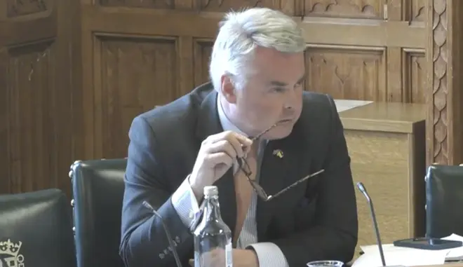 Tim Loughton was shown rolling his eyes during the disruption.