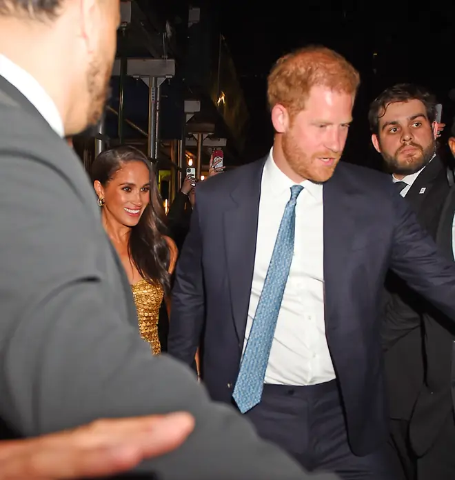 Harry and Meghan leaving the award show on Tuesday night