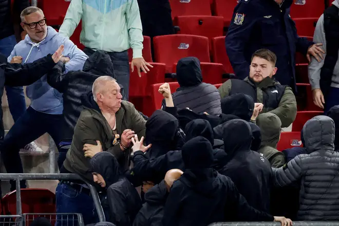 Supporters attack relatives of West Ham United players during the Conference League match between AZ Alkmaar v West Ham