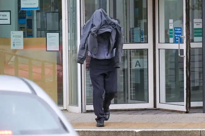 Timothy Schofield, the brother of TV presenter Phillip Schofield, covering his head as he left Exeter Crown Court last month.