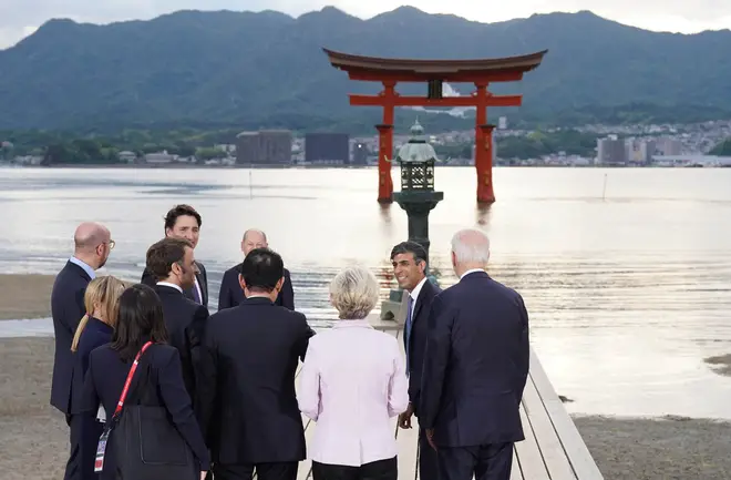 The leaders visiting the Itsukushima shrine near Hiroshima