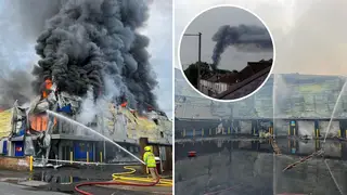 A thick plume of smoke could be seen bellowing into the skies above Surrey on Friday, as a blaze ripped through a self-storage warehouse.