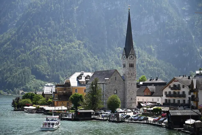 The fence has since been taken down, but Hallstatt's mayor says he wants to put up a banner to remind tourists that people live in the area.